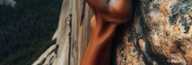 close-up of someone rock climbing on El Capitan, focus on the hands and fingers gripping the rock